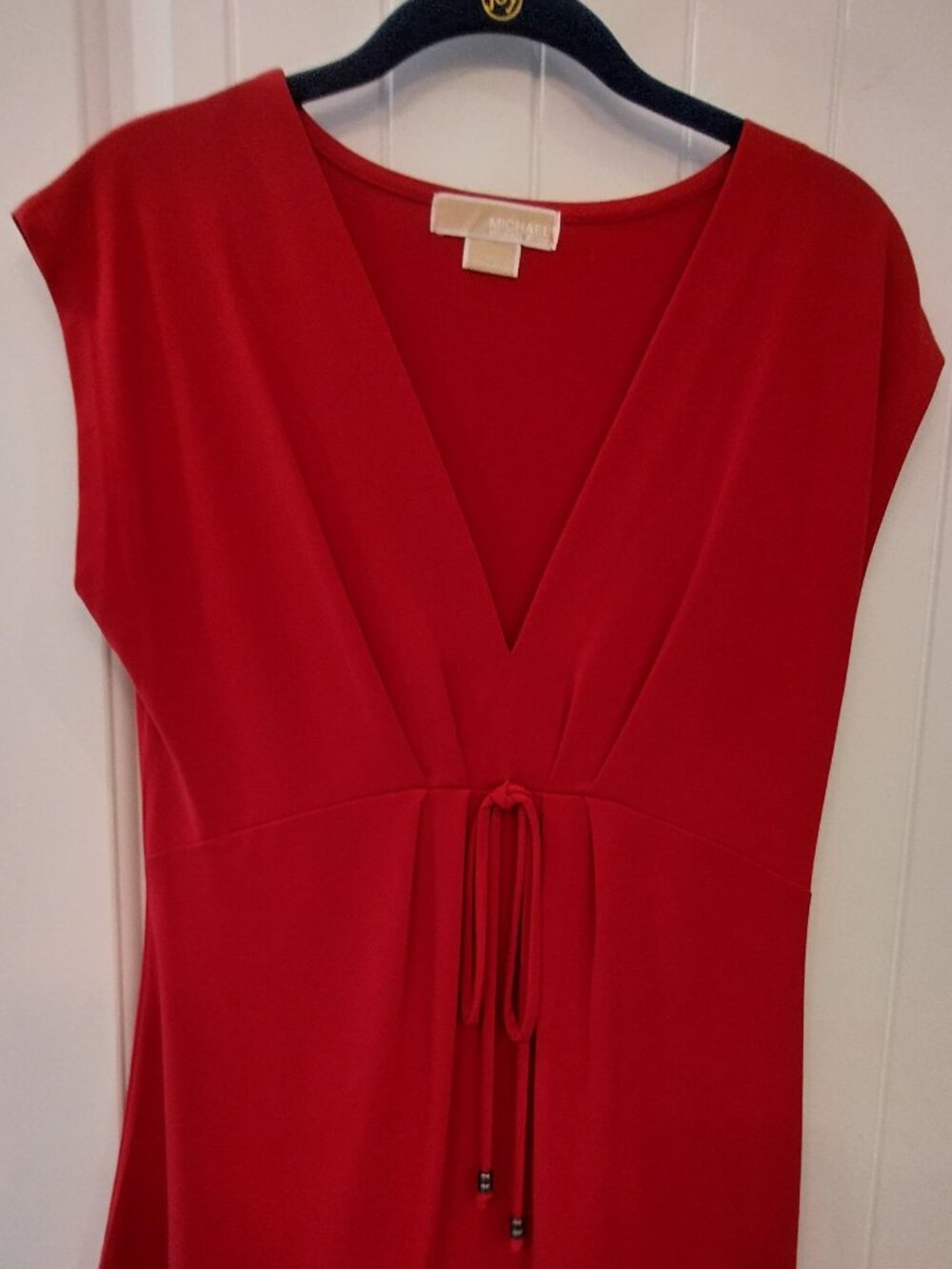 Red Sleeveless Blouse